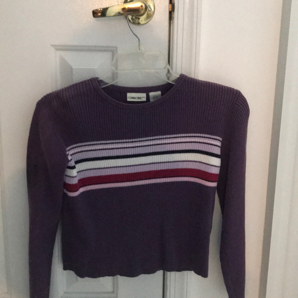 Girl’s purple sweater with stripes